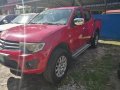 Red Mitsubishi Strada 2011 at 67000 km for sale -5