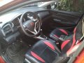 Red Honda City 2009 at 97000 km for sale -0