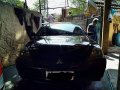 Black Mitsubishi Lancer 2010 for sale in Quezon City-8