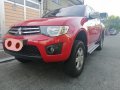 Sell Red 2013 Mitsubishi Strada in Quezon City -8