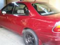 Red Mazda 323 1999 at 100000 km for sale-2