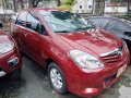 Red Toyota Innova 2009 for sale in Quezon City-1