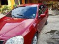 Sell Red 2004 Chevrolet Optra Manual Gasoline -9