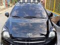 Selling Black Toyota Wigo 2014 in Manila-8