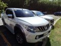 White Mitsubishi Strada 2017 for sale in Silang-22