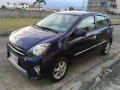Blue Toyota Wigo 2016 for sale in Cavite -1