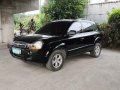 Selling Black Hyundai Tucson 2009 at 92000 km-3