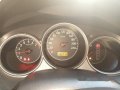 Red Honda City 2005 at 95000 km for sale -0