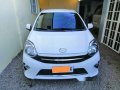 Sell White 2014 Toyota Wigo in San Pablo-0
