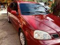 Sell Red 2004 Chevrolet Optra Manual Gasoline -0