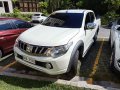 White Mitsubishi Strada 2017 for sale in Silang-1