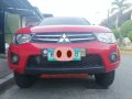 Sell Red 2013 Mitsubishi Strada in Quezon City -9