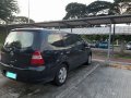 Selling Black Nissan Grand Livina 2011 Automatic Gasoline -4
