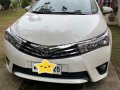 Pearl White Toyota Corolla altis 2015 for sale in Caloocan-0