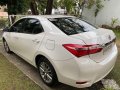 Pearl White Toyota Corolla altis 2015 for sale in Caloocan-5