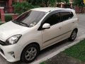 Pearlwhite Toyota Wigo 2014 for sale in Malolos-0