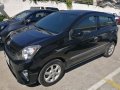 Selling Black Toyota Wigo 2015 in Manila-2