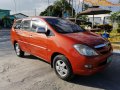 Orange Toyota Innova 2005 for sale in Manila-4