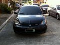 Sell Black 2009 Mitsubishi Lancer in Quezon City-4