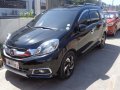 Black Honda Mobilio 2015 SUV / MPV at Automatic  for sale in Calamba-6