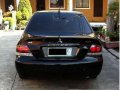 Sell Black 2009 Mitsubishi Lancer in Quezon City-3