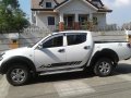 White Mitsubishi Strada 2010 for sale in Manila-4