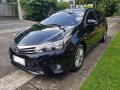 Black Toyota Corolla altis 2015 for sale in Manual-12