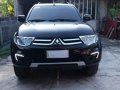 Sell Black 2015 Mitsubishi Montero sport in Manila-0