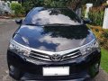 Black Toyota Corolla altis 2015 for sale in Manual-13