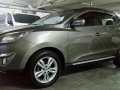 Golden Hyundai Tucson 2016 for sale in Robinsons Magnolia-1
