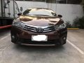 Sell Brown 2014 Toyota Corolla altis in Carmona-6