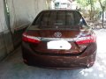 Sell Brown 2014 Toyota Corolla altis in Carmona-1