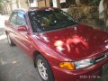 Selling Red Mitsubishi Lancer 1996 in Quezon City-0