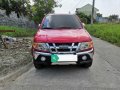 Red Isuzu Sportivo 2010 for sale in Baliuag-1