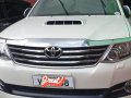 Pearl White Toyota Fortuner 2015 for sale in Quezon City-0
