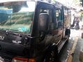 Black Isuzu Elf 1994 for sale in Manual-2