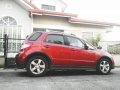 Red Suzuki Sx4 2010 for sale in Manila-0