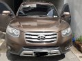 Brown Hyundai Santa Fe 2012 for sale in Quezon City -2