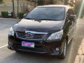 Selling Black Toyota Innova 2014 in Quezon City-2