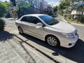 Pearl White Toyota Corolla Altis 2010 for sale in Automatic-4