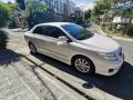 Pearl White Toyota Corolla Altis 2010 for sale in Automatic-1