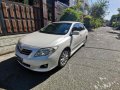 Pearl White Toyota Corolla Altis 2010 for sale in Automatic-1