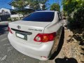 Pearl White Toyota Corolla Altis 2010 for sale in Automatic-3