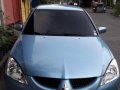 Blue Mitsubishi Lancer 2005 for sale in Caloocan-2