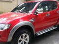 Red Mitsubishi Strada 2012 Truck for sale in Talisay City-3