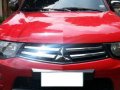 Red Mitsubishi Strada 2012 Truck for sale in Talisay City-4