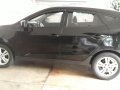 Selling Black Hyundai Tucson 2012 SUV / MPV in Quezon City-1