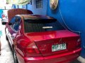 Red Mitsubishi Lancer 2001 for sale in Quezon City-3
