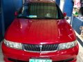 Red Mitsubishi Lancer 2001 for sale in Quezon City-8