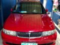 Red Mitsubishi Lancer 2001 for sale in Quezon City-1